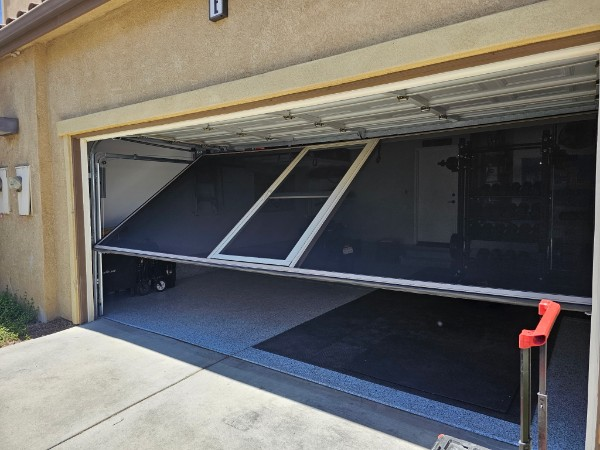 Premium screened patio enclosure at sunset